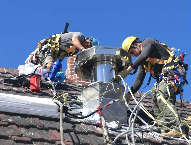 Protective chimney cap installed by Newark Chimney Sweep in Newark, OH
