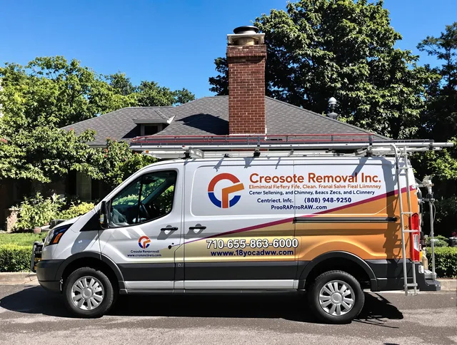 Newark Chimney Sweep technician removing creosote safely in Newark, OH